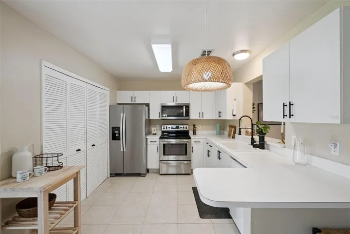 Kitchen with Stainless steel appliances and large sink