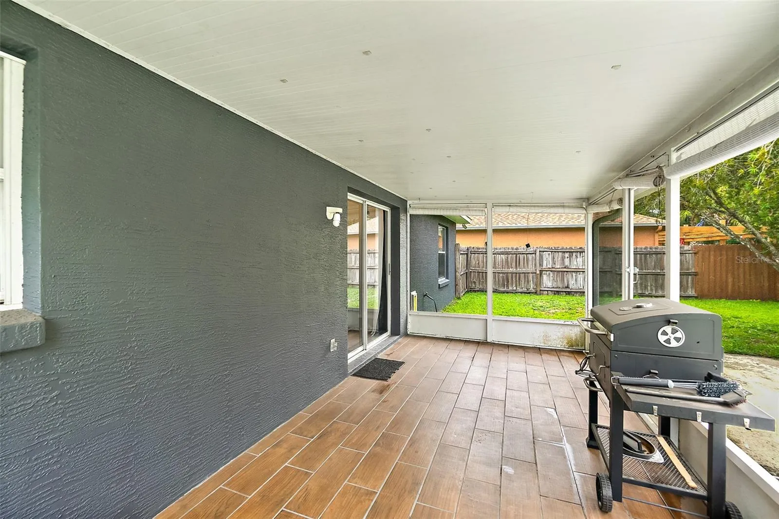 Covered & Screened Rear Patio