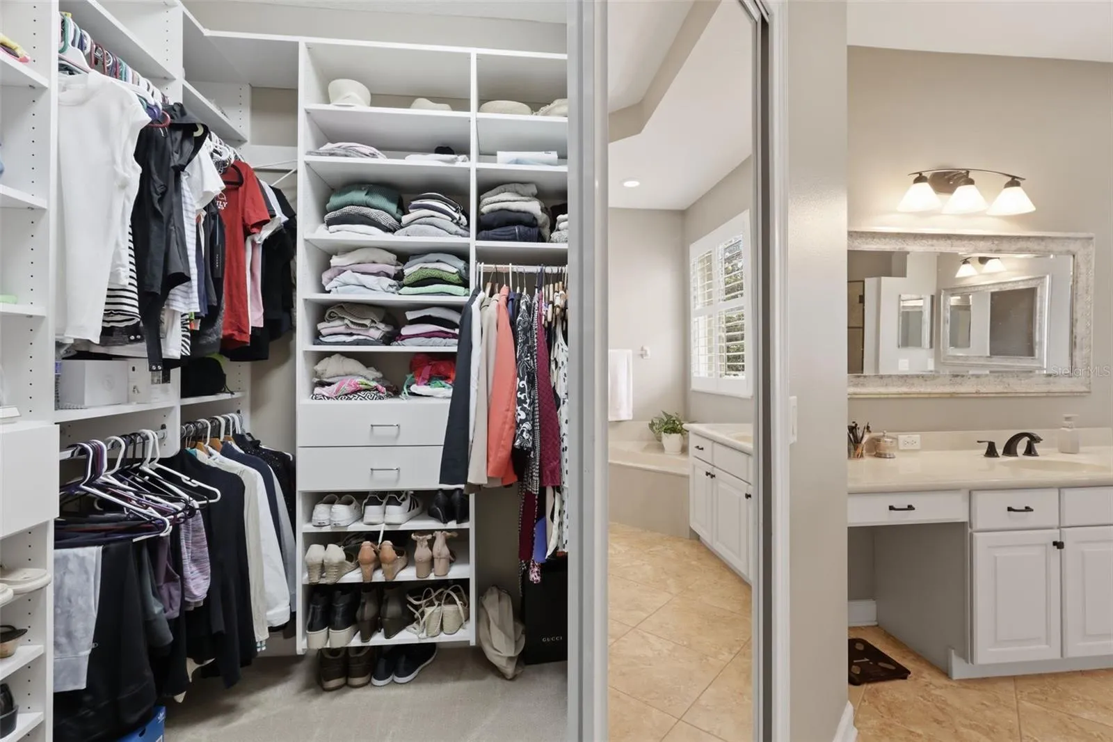 One of the 2 primary bedroom custom closets.