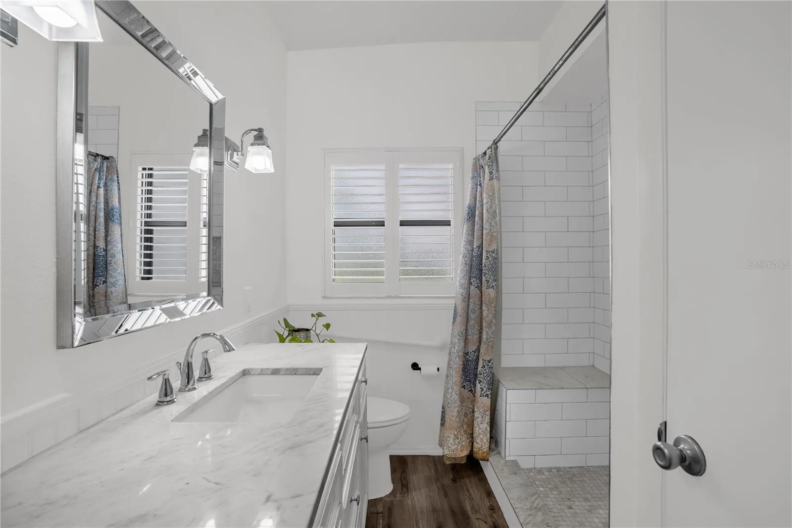 Guest Bathroom with bench in shower