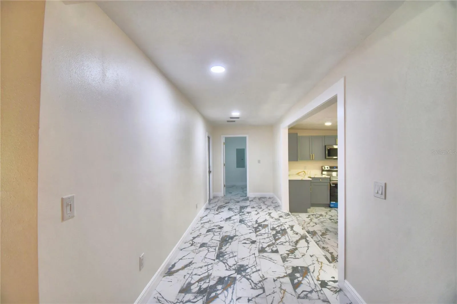 Enormous hallway to the garage/laundry room