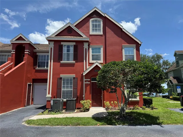 Lake Chase 1/1 condo with a 1 car garage + a 1 car carport!