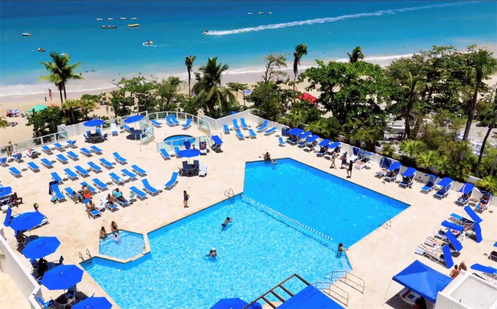 FOR REFERENCE ONLY: The pool is currently under renovation and not usable. This is a photo before renovation, so you can get an idea of why ESJ Towers has always bee a favorite resort on Isla Verde Beach.