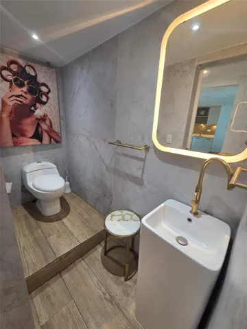 Water Closet is separate from the double vanity and shower for optimal privacy.