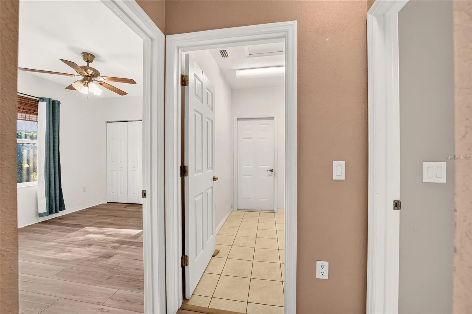 Laundry room and 3rd bedroom across the house