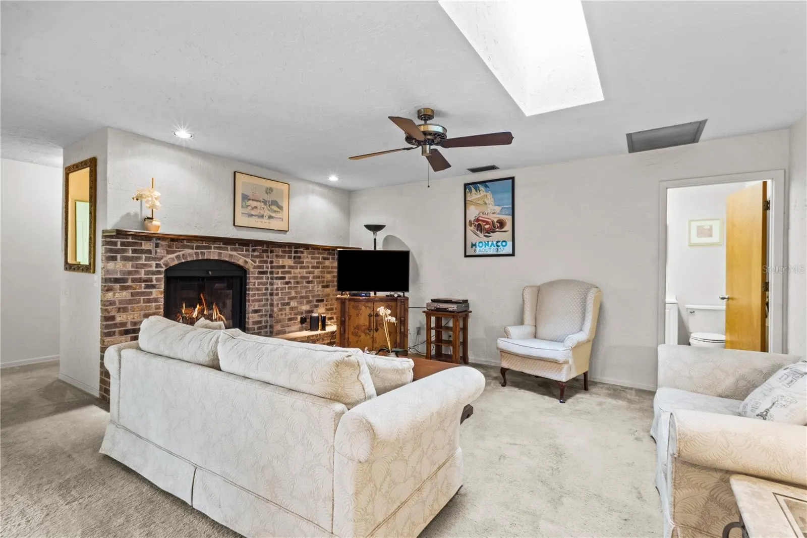 Family Room with Fireplace and Skylight