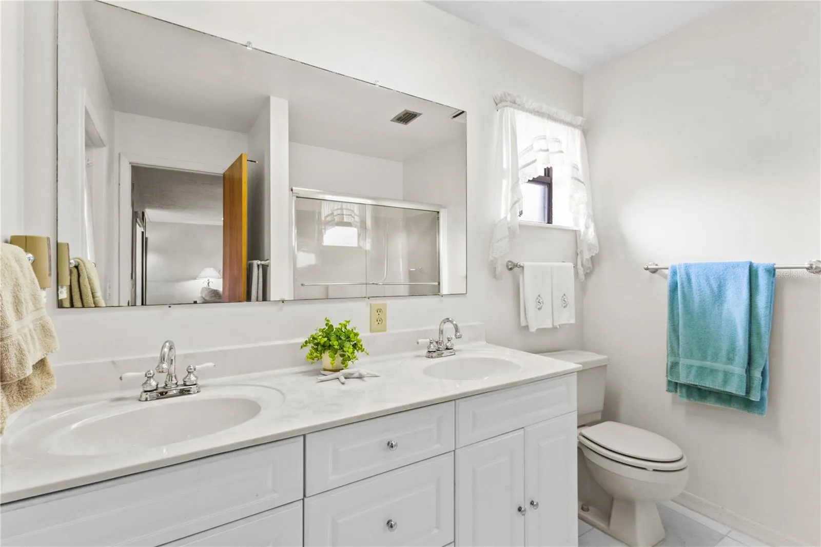 2nd Bathroom, with Shower-Tub Combination and Dual Sinks