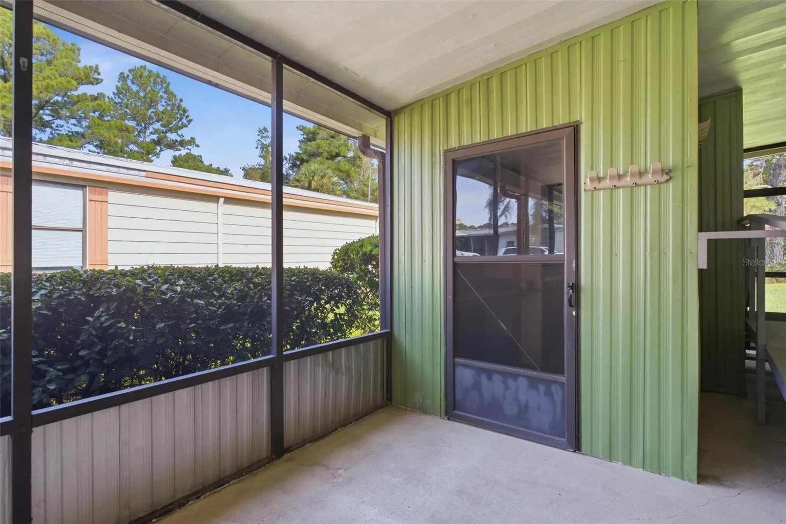 Screen porch, door to utility room