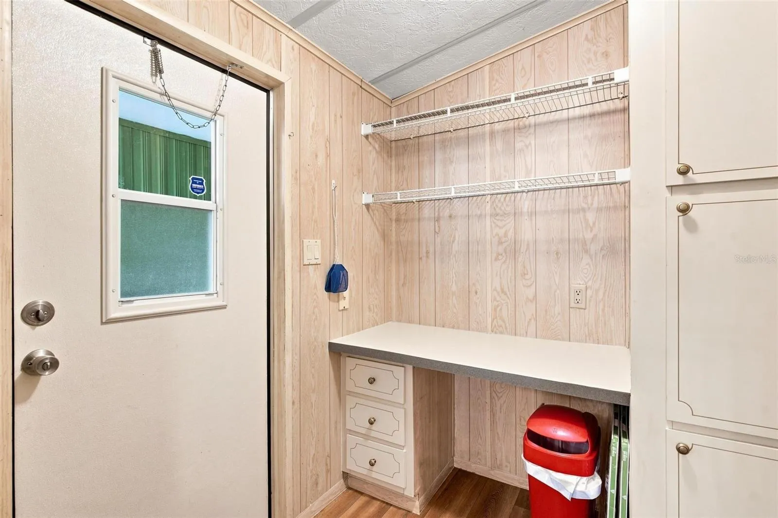 Built in desk by back door.