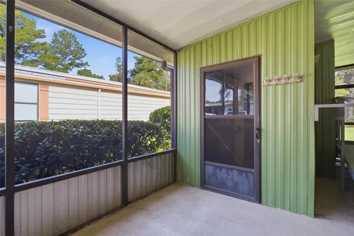 Screen porch, door to utility room