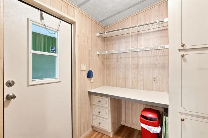 Built in desk by back door.