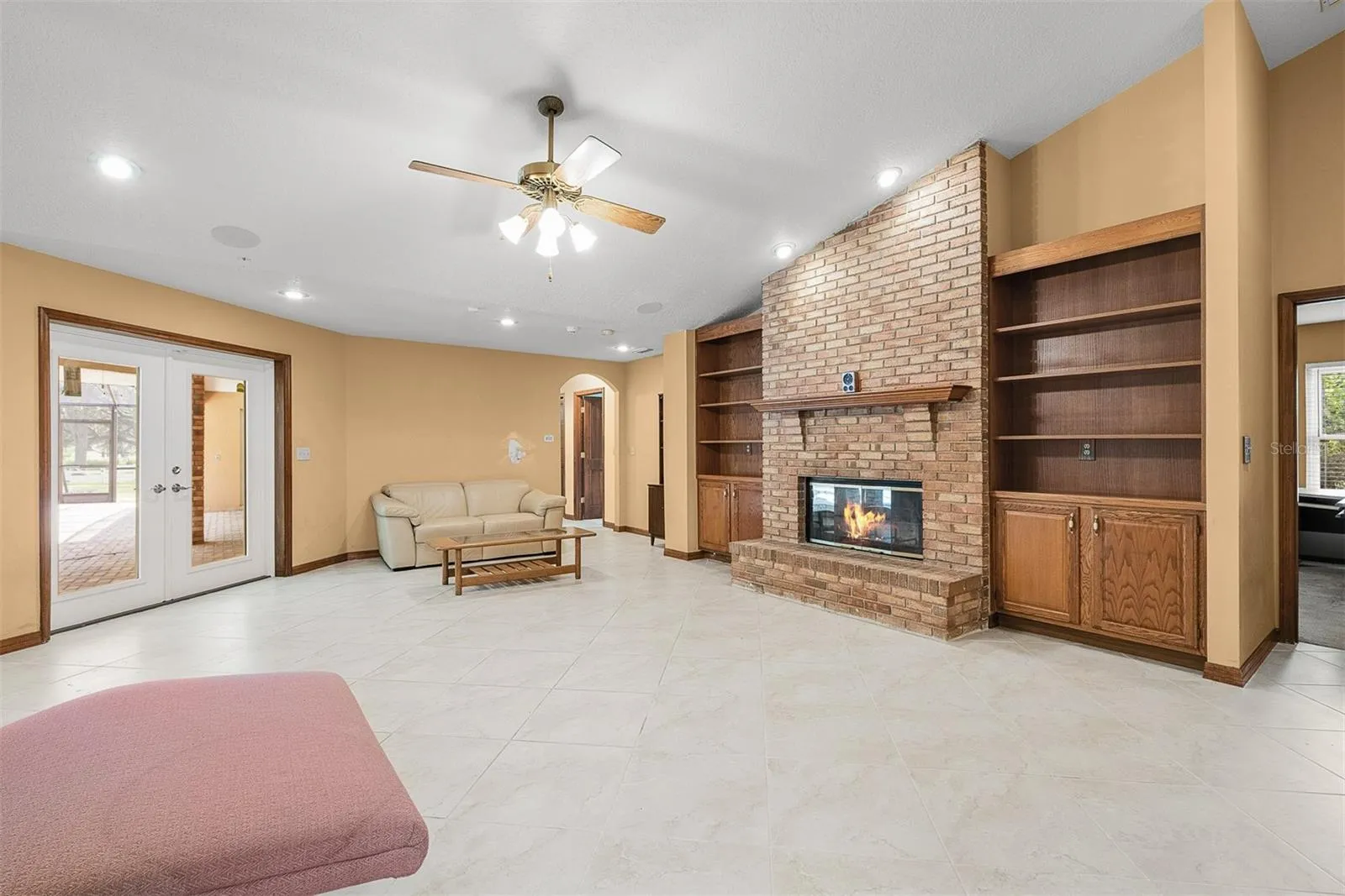 Living Room Open to Pool Enclosure
