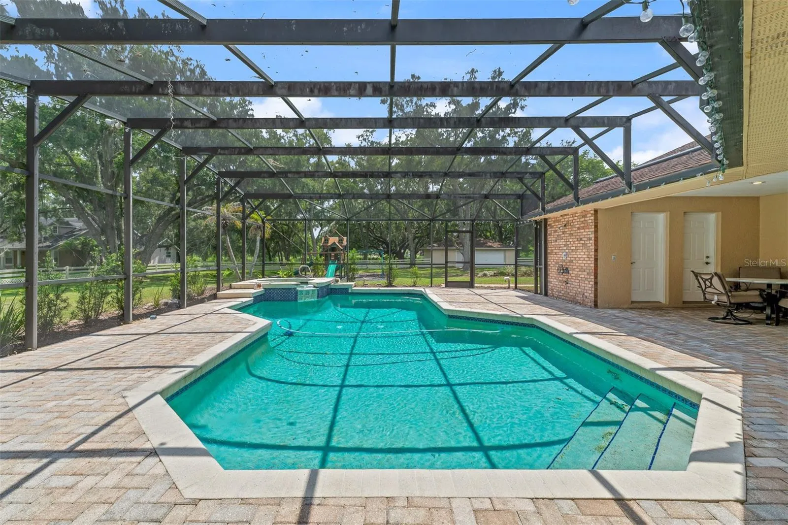 Pool surrounded by Pavers