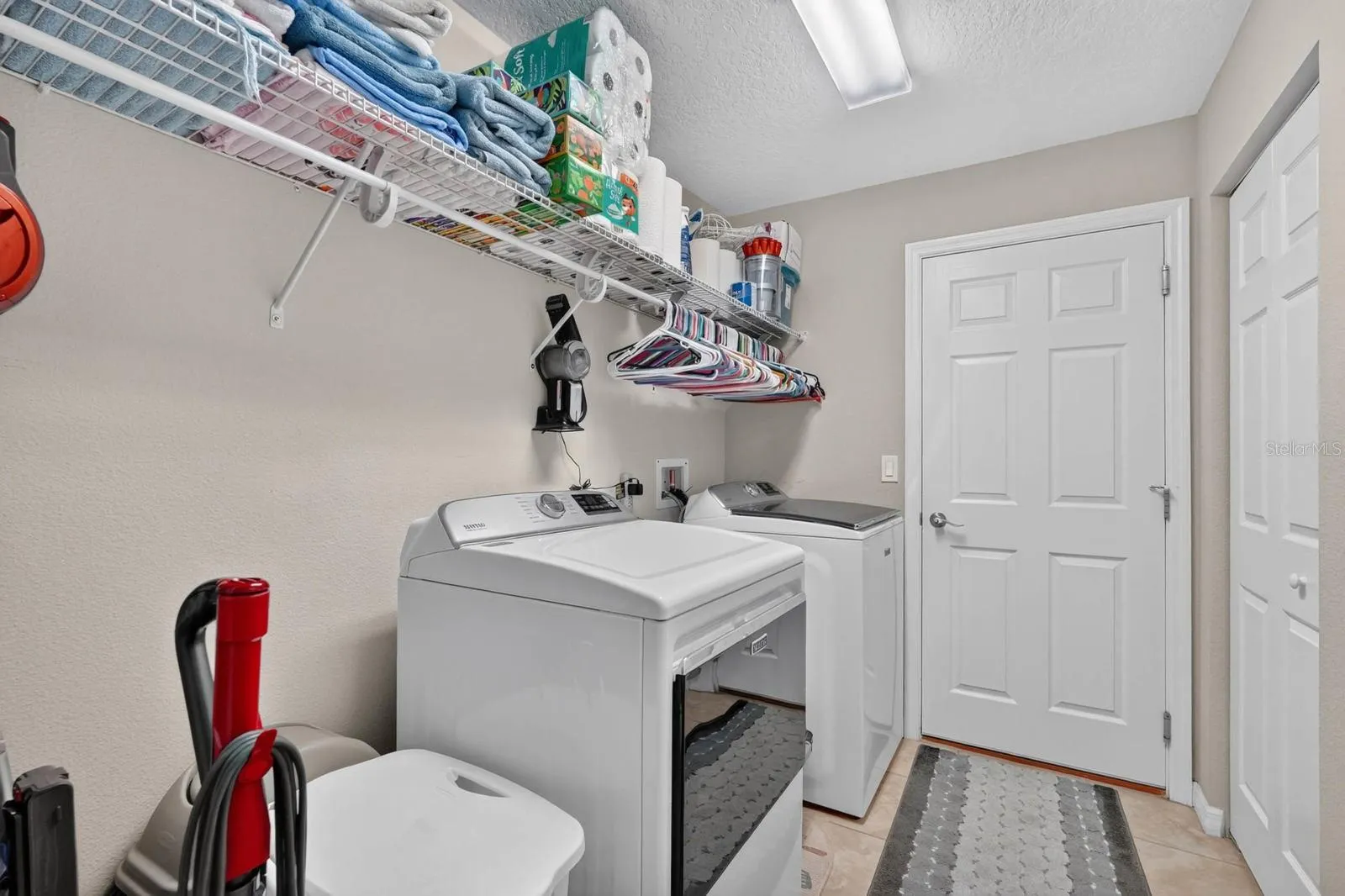 Large laundry room with closet