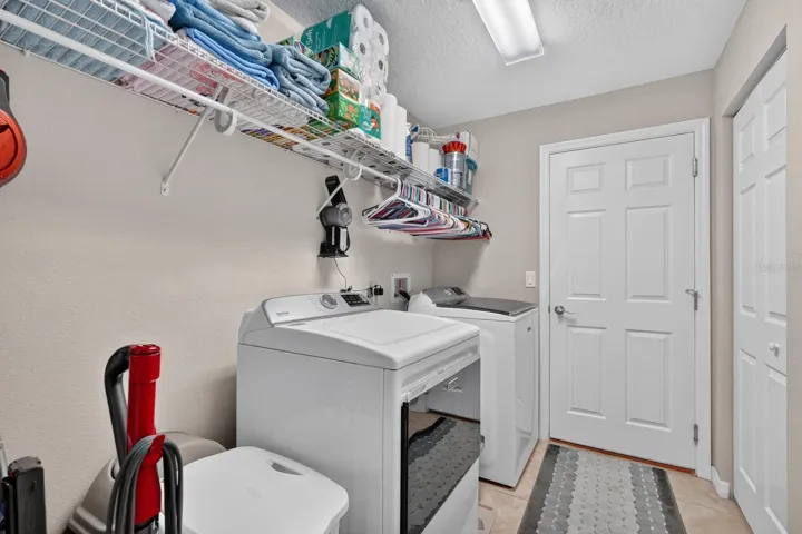 Large laundry room with closet