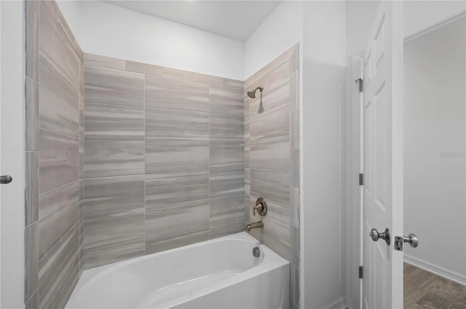 Tub and shower in bathroom two