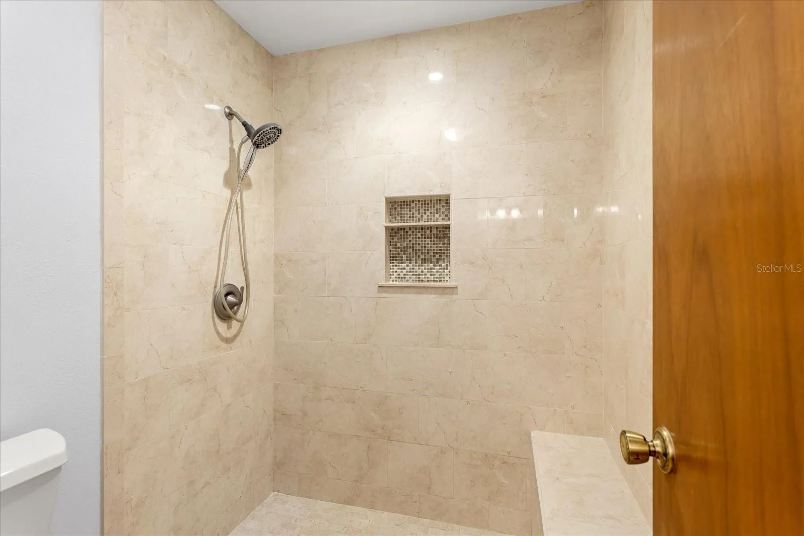 Primary en-suite large step-in shower with bench