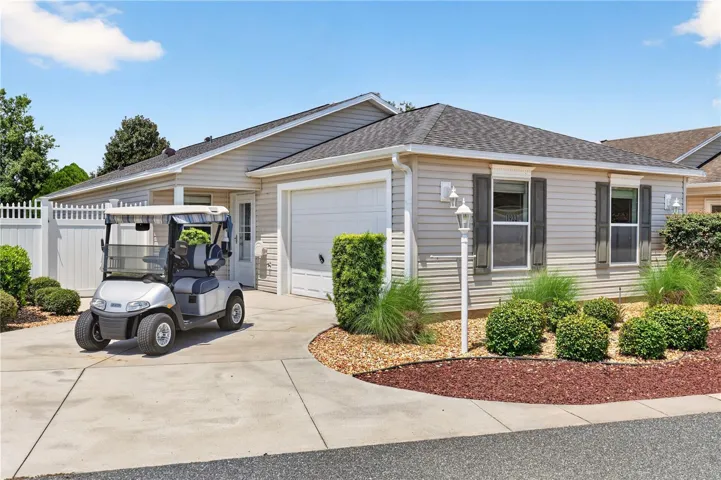 WELCOME HOME! MOVE IN READY, WITH GOLF CART INCLUDED!