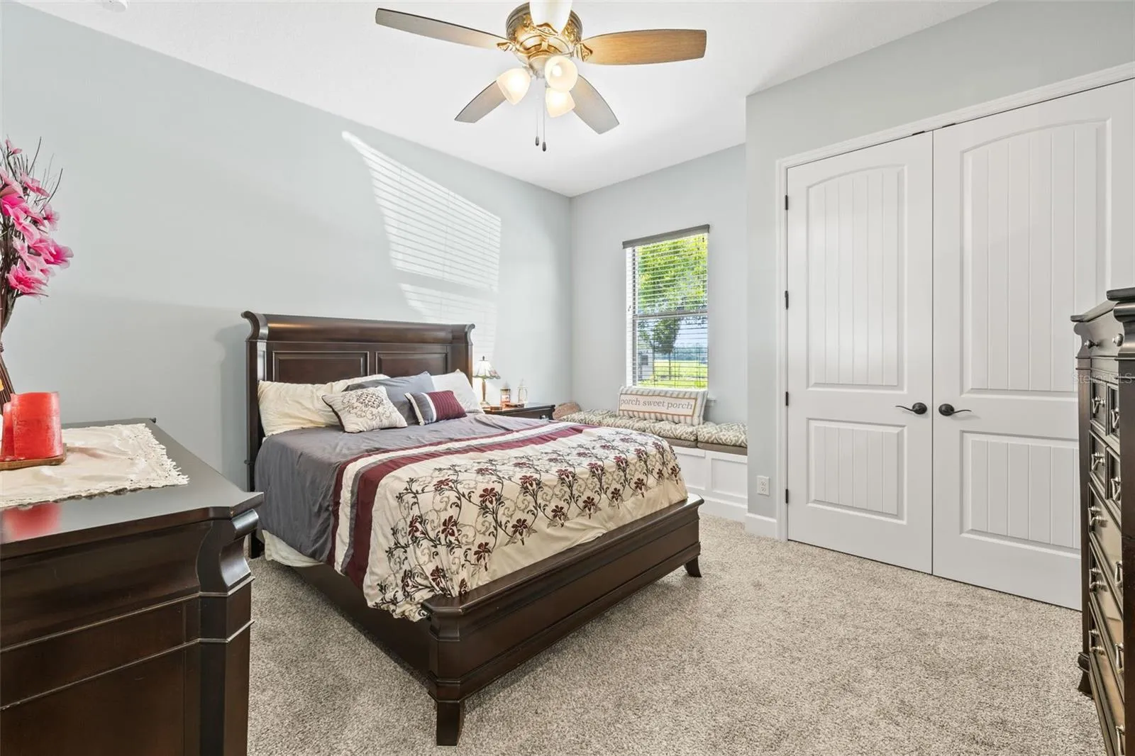 bedroom 2 with bench seat at window