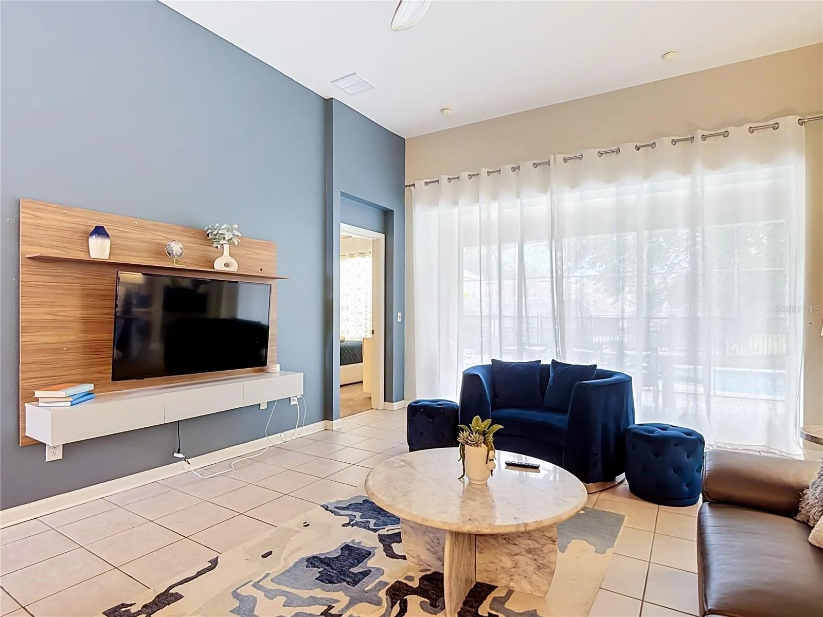 Another view of the spacious living room and entertainment area.