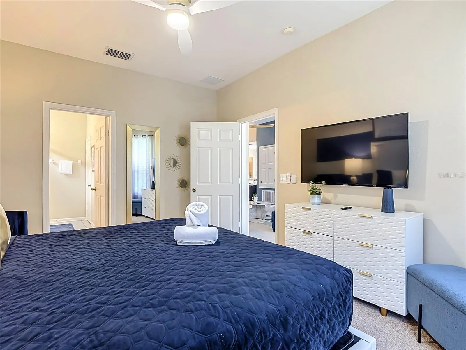 Spacious primary suite with direct access to the ensuite bath.