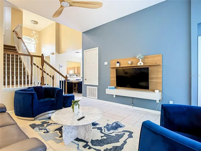 Living room featuring soaring ceilings and an open-concept design.