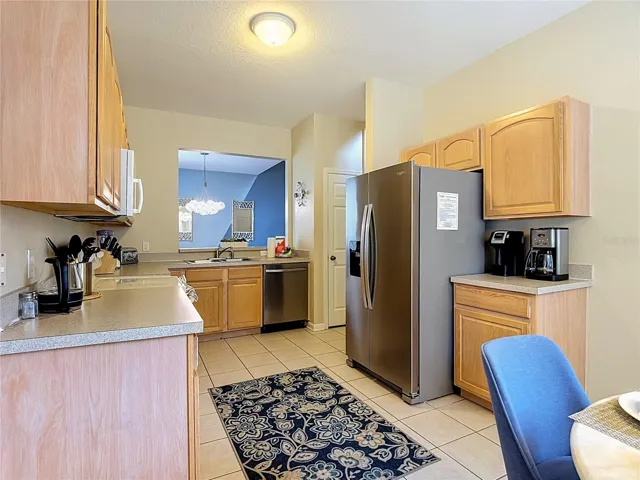 Kitchen offering ample cabinet and counter space.