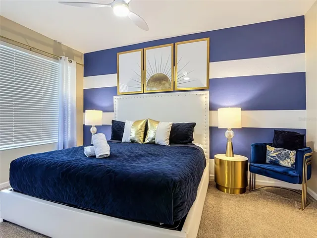 First-floor primary suite with king bed and private ensuite bathroom.