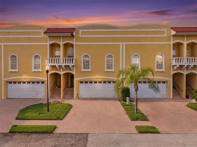 Front of Home 2 car garage and parking for at least 2-4 cars in driveway