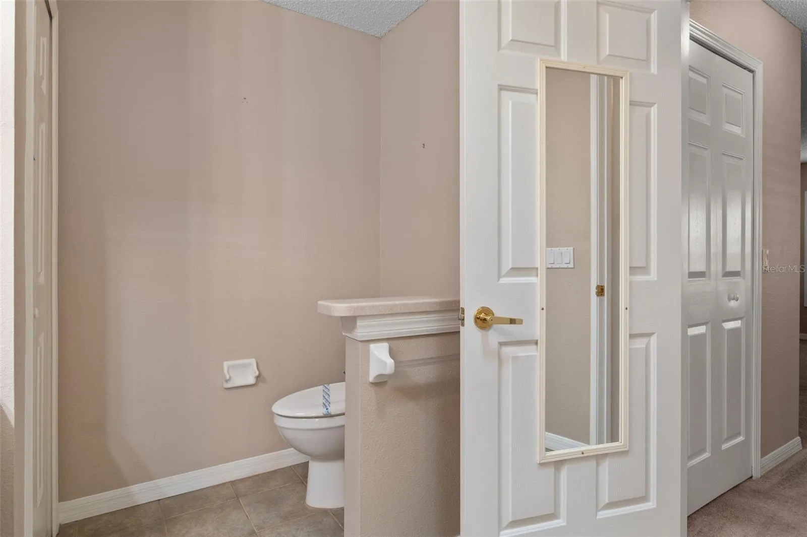 primary bath with privacy toilet