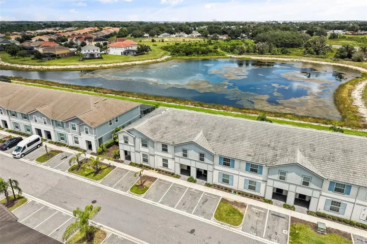 Aerial view of the property and community