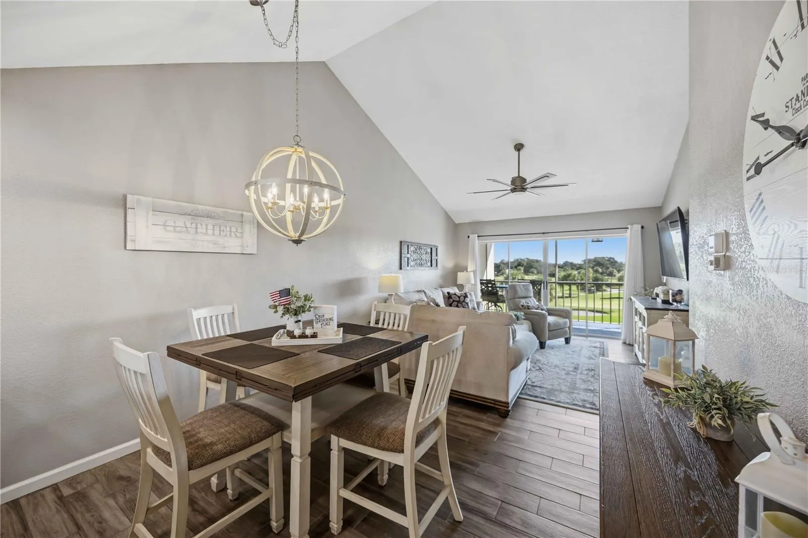 Dining area opens naturally toward the living room and outdoor views, creating an ideal setting for relaxed entertaining.