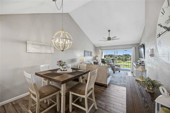Dining area opens naturally toward the living room and outdoor views, creating an ideal setting for relaxed entertaining.