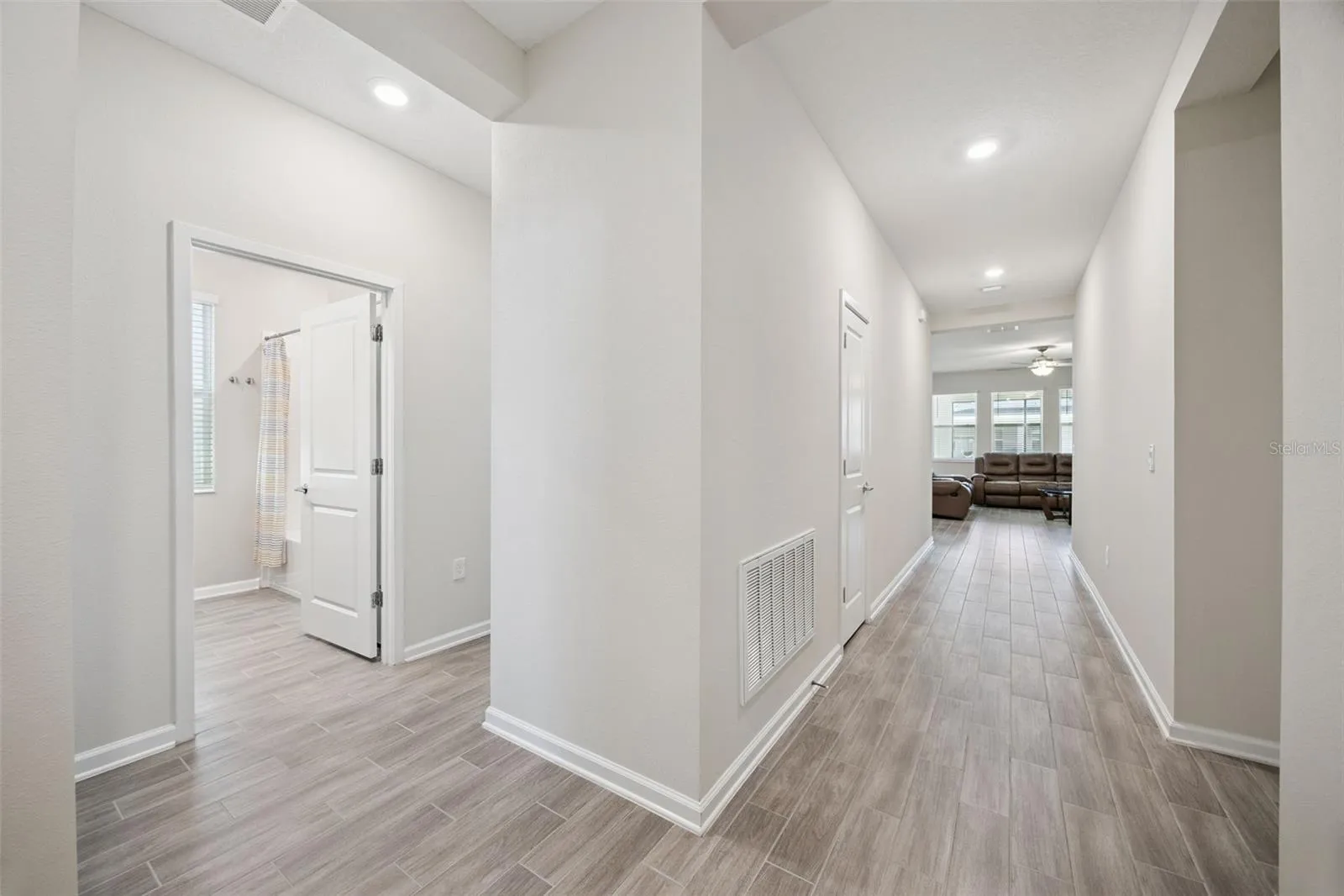 Foyer View-Guest Bath &amp; Main Living Area