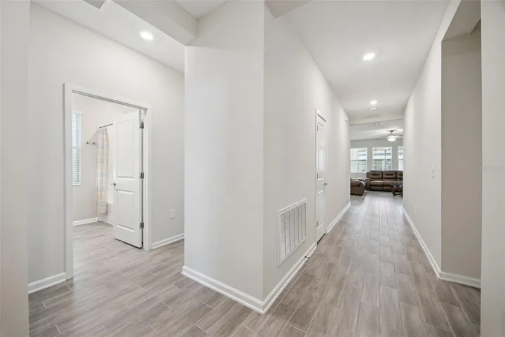 Foyer View-Guest Bath &amp; Main Living Area