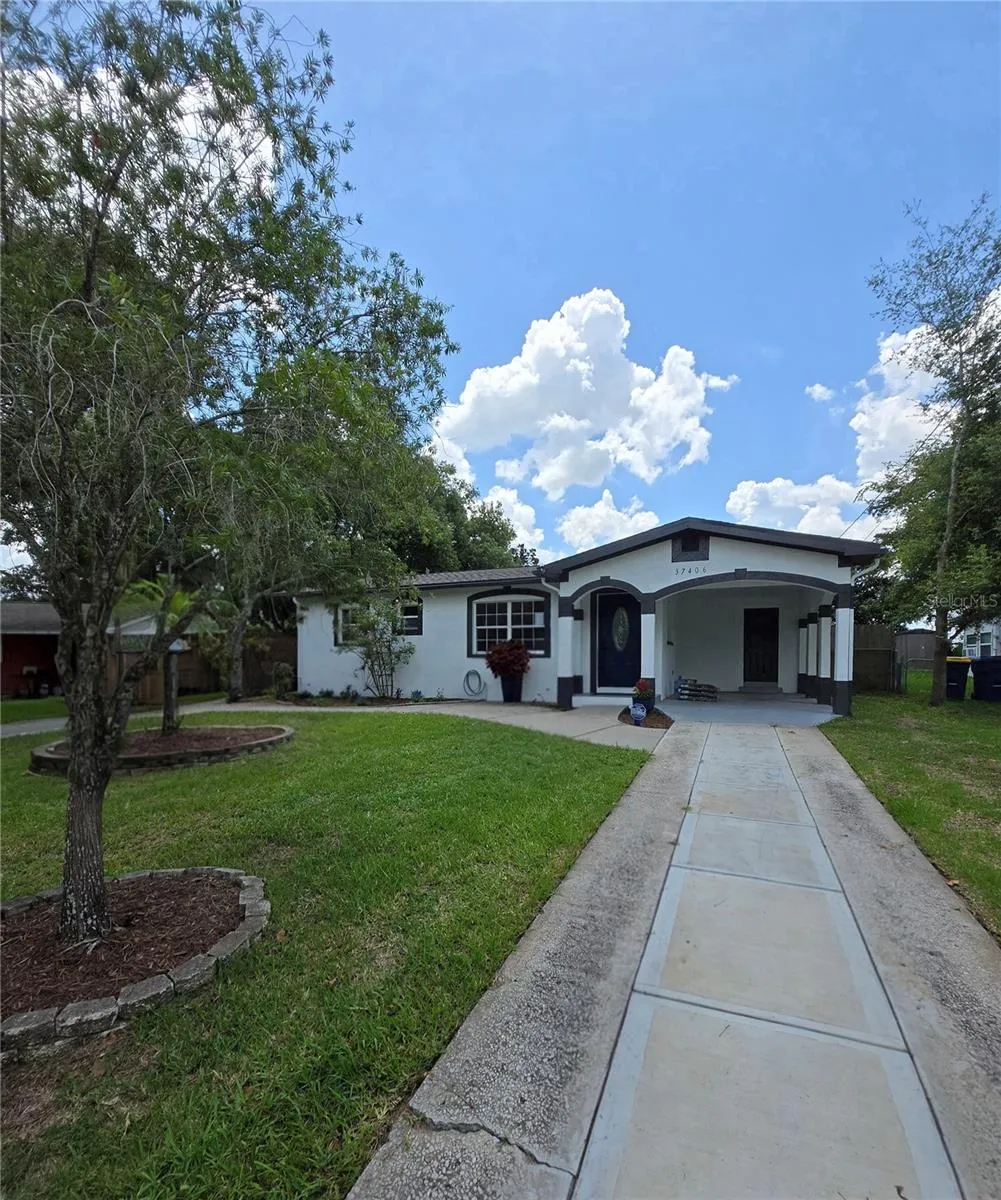 Look at that long driveway and yet another driveway to the left.