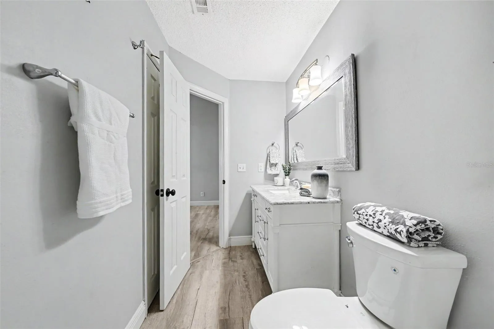 Primary Bath ensuite with linen closet