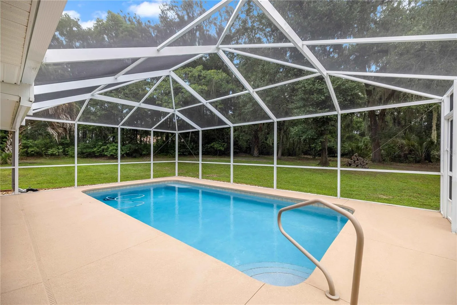 Beautiful salt water and heater pool with private view to wooded area of the 3 acres