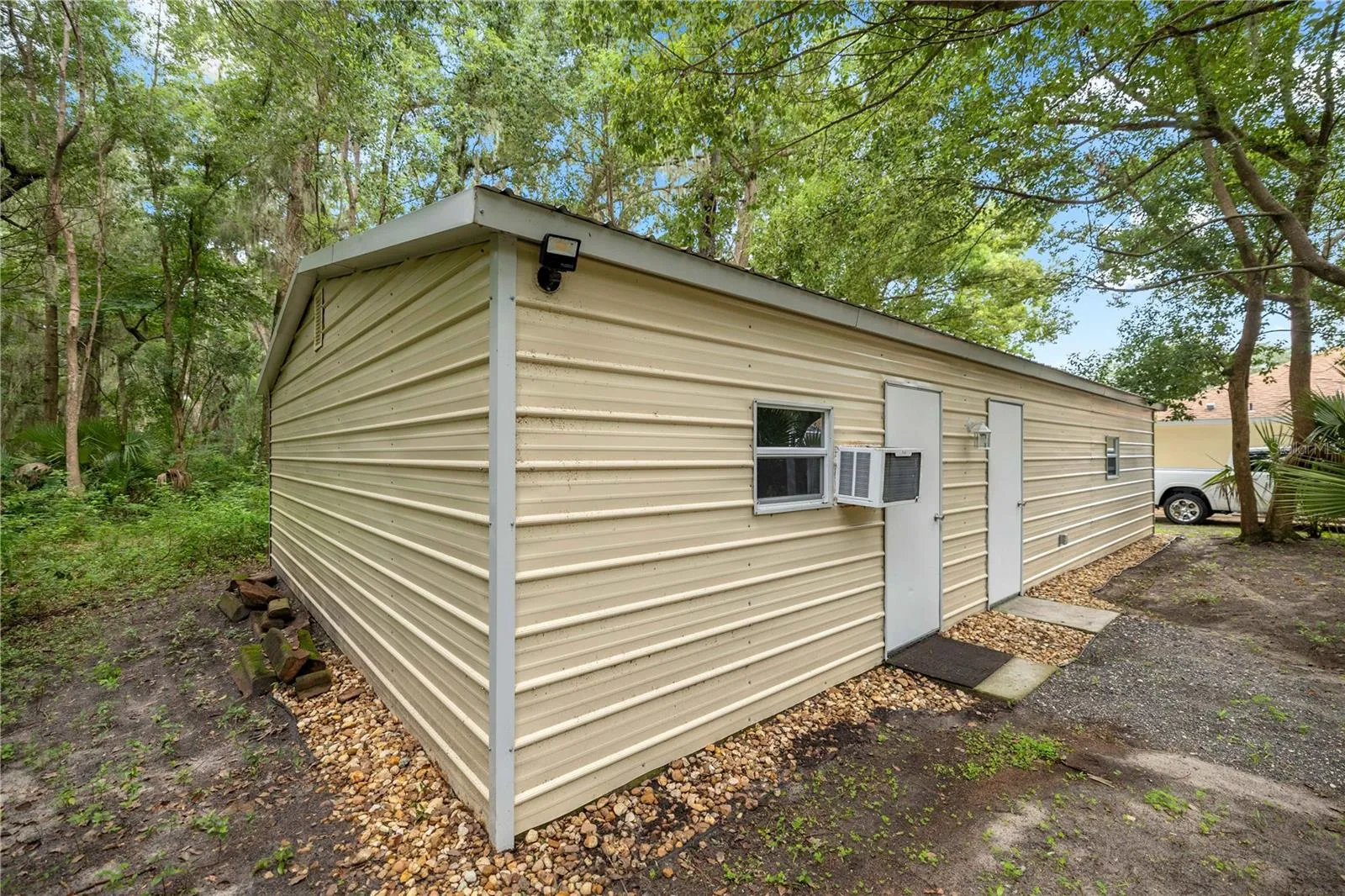 Outside view of storage building and garage