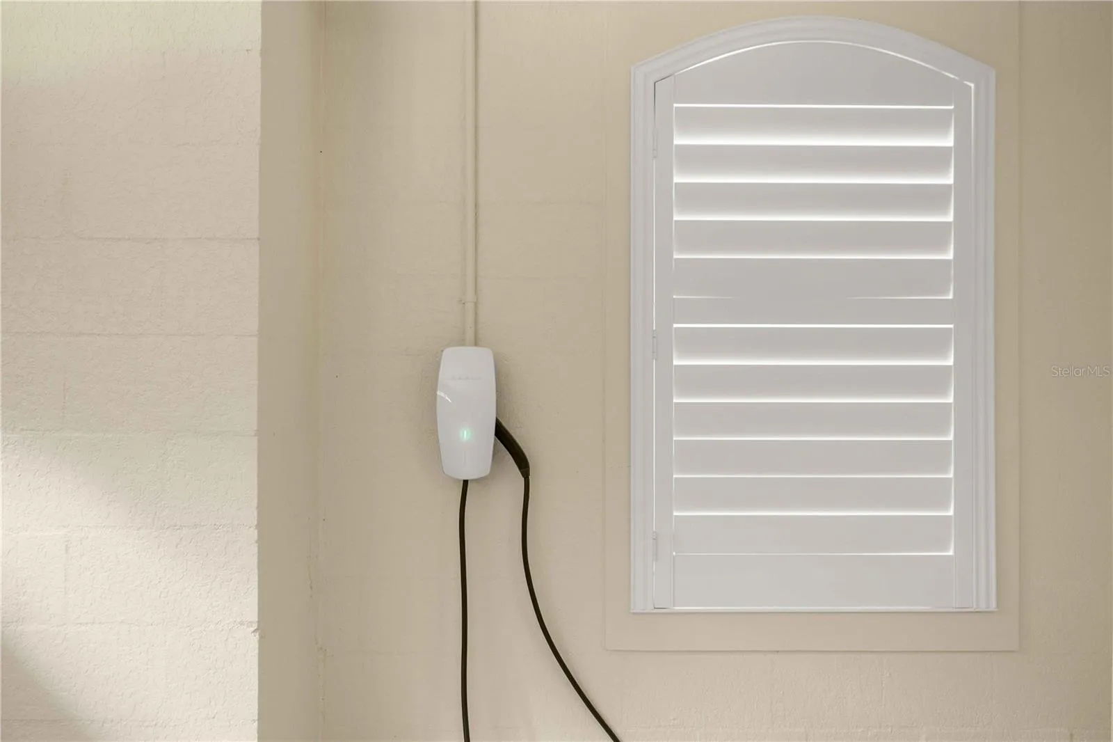 Tesla charger in main house 2 car garage
