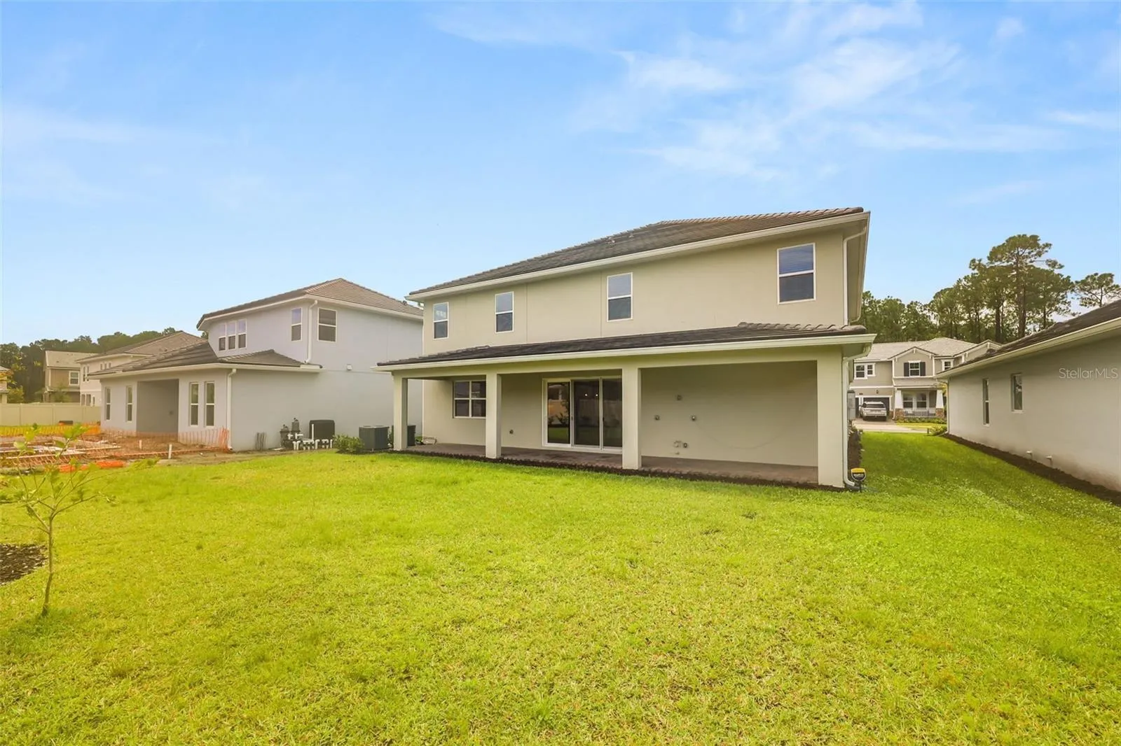Large back yard with plenty of space for a pool