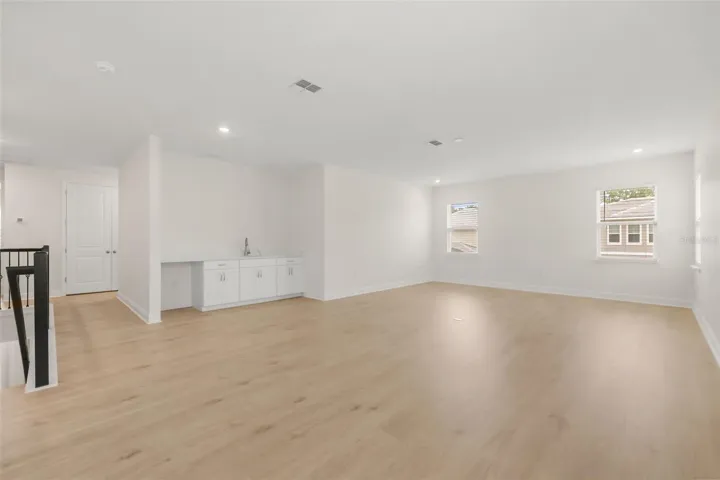 2nd floor loft with tons of space and a wet bar