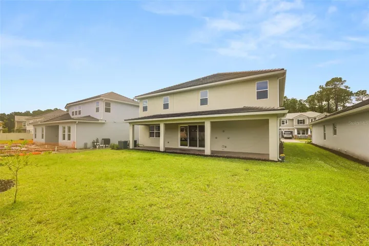 Large back yard with plenty of space for a pool