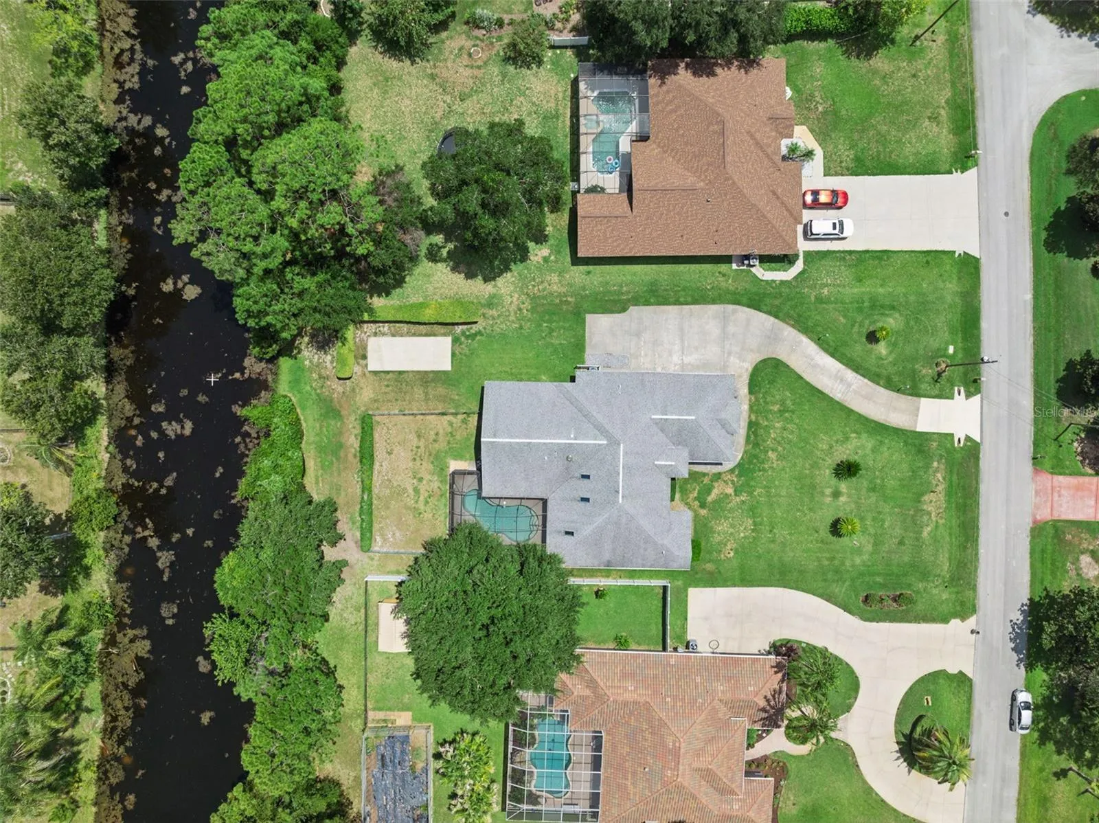 Aereal view / home backs up to  Canal