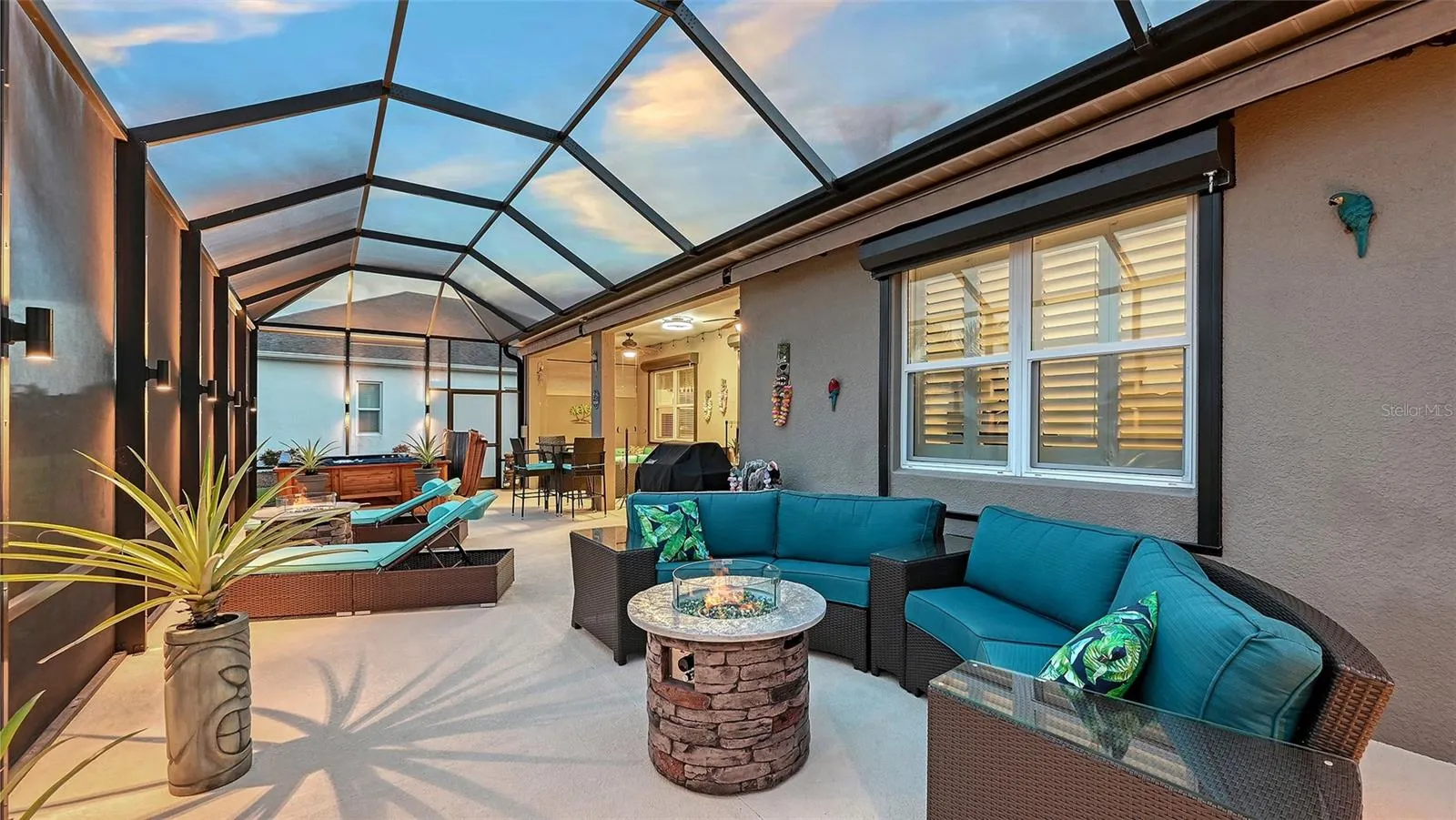 Outdoor entertaining area with pond views