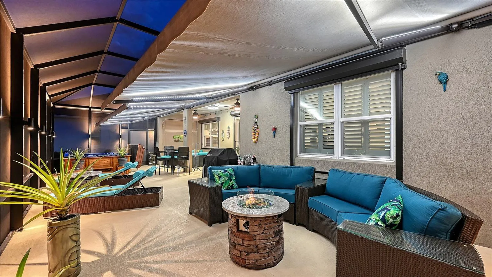 Outdoor entertaining area with pond views