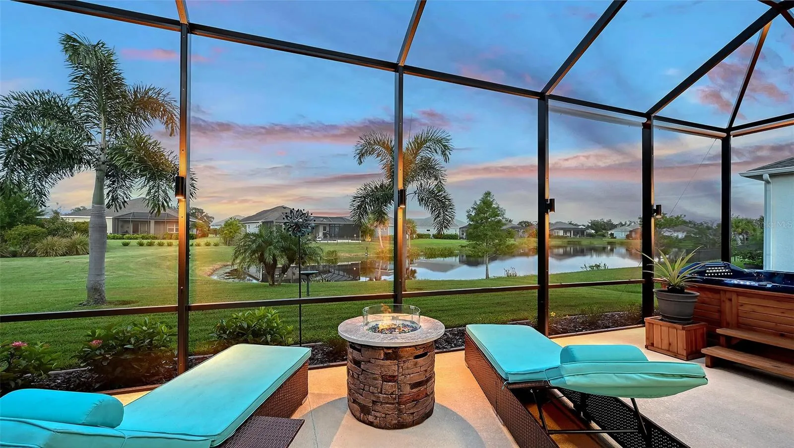 Outdoor lounge area with pond view