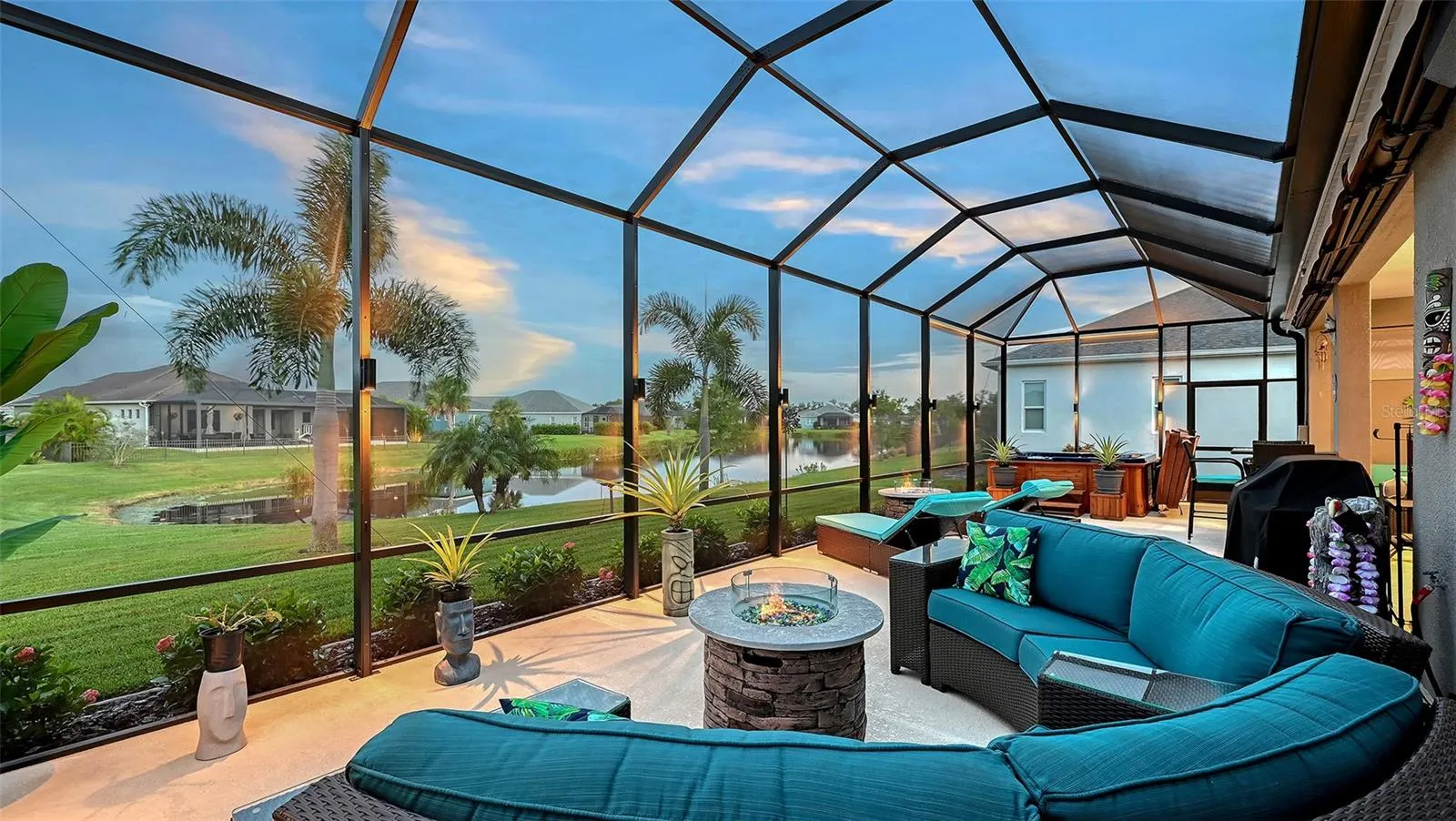 Outdoor entertaining area with pond views - awnings retracted