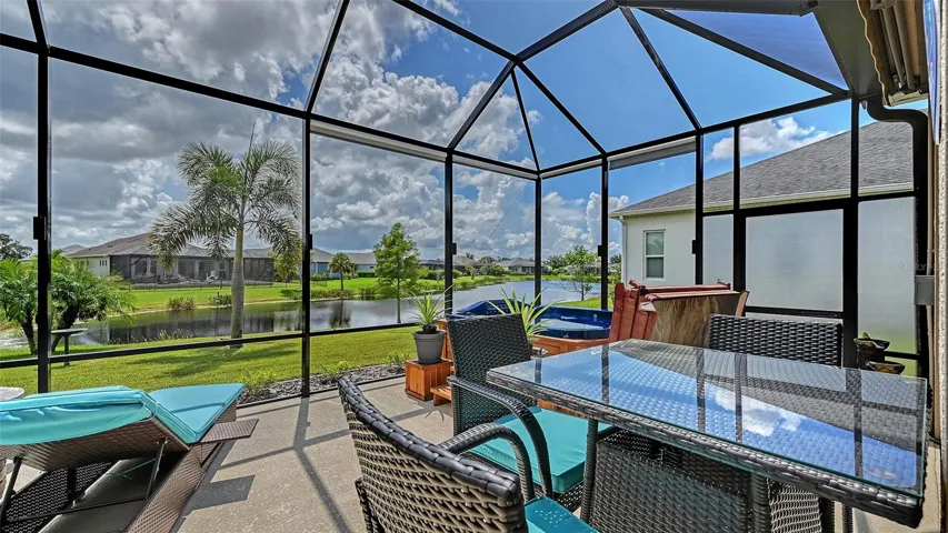 Outdoor entertaining area with pond views