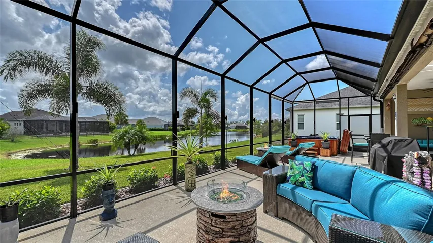 Outdoor entertaining area with pond views
